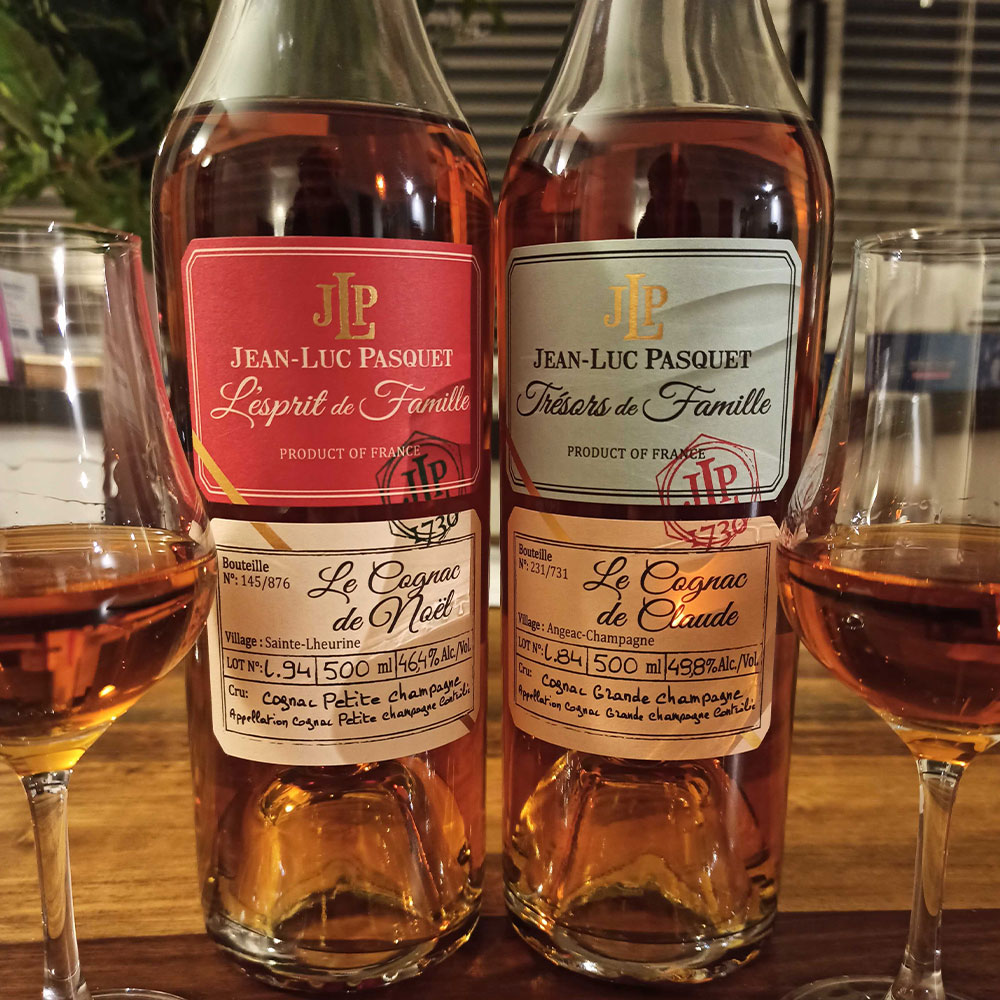 L'Esprit de Famille Le Cognac de Noel and Le Tresor de Famille Le Cognac de Claude during a tasting with glasses